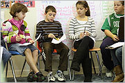 Students participate in a lesson about bullying