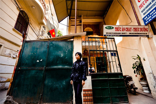 Hanoi's vegetarian restaurants are flourishing. Minh Hang, co-owner with her husband, Le Chi Dung Hang, (in background) of Nam An restaurant, operates what could be Hanoi's tastiest vegetarian restaurant. Some dishes at this no-frills, family-run eatery, such as a carrot-and-tarot version of a chicken drumstick, are clearly designed to resemble meat. But for the most part, Nam An's friendly cooks seem to be less interested in what their food resembles than whether it is delicious.