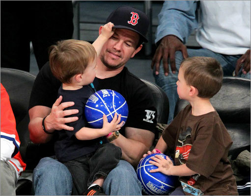 Actor Mark Wahlberg attended NBA All-Star Saturday Night with sons Michael and Brendan.