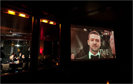 Revelers watched the Oscars, sipped bubbly, and judged celeb style at Noir's Academy Awards soiree. The beautiful people also walked the red carpet for a chance to win brunch for two at Henrietta's Table. Pictured: Justin Timberlake does an interview on the red carpet (on TV) during the Oscars viewing party.