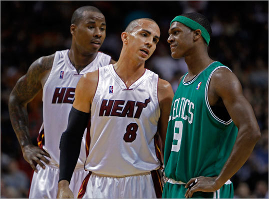 Carlos Arroyo (center) is the latest -- and likely the last -- Celtic to enter the fold this season. Arroyo was waived by Miami after the Heat signed Mike Bibby. Arroyo has played in 49 games this season, averaging 5.6 points and 2.0 assists. He is shooting nearly 46 percent from the field and nearly 44 percent from the 3-point line.