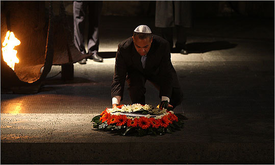 Governor Deval Patrick spent part of the fourth day of his 10-day trade mission to Israel and England touring Yad Vashem, Israel's Holocaust Memorial and Museum. Read the full story . Read on to see more scenes from Patrick's trip. Patrick laid a wreath on concrete slab that is atop the ashes from extermination camps at the Holocaust museum.
