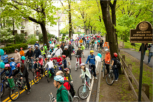 Have two wheels, will travel. Hundreds of hardy bike riders braved the rain to participate in Sunday's Brookline Bike Parade . (Organizers canceled the after-party and refreshments at Amory Park because of the weather.) Pictured: Participants waited for the ride to begin.