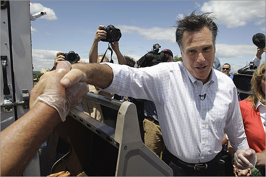 Romney shook hands with supporters at the Stratham, N.H., event.