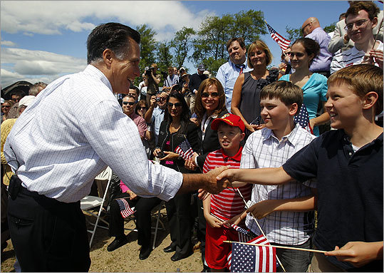 Romney greeted supporters after his presidential announcement.