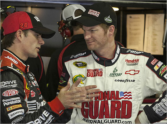 “The connection between ethanol and middle America and NASCAR can put a real American face on going green,” Gravellese said. “Dale Earnhardt Jr. definitely has a better ability to push that message than Barack Obama does.” Shown: Jeff Gordon (left) talking to Dale Earnhardt Jr. in their garage during the Sprint Cup final practice Friday.