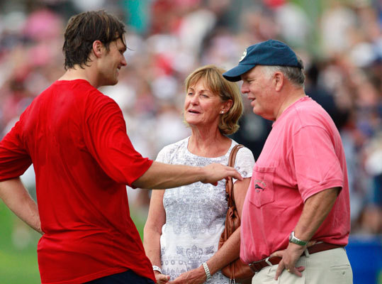 Aug. 9 Tom Brady talks with his parents Galynn (center) and Tom, after practice at training camp in Foxborough.