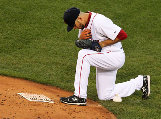 Red Sox pitcher Alfredo Aceves prays on the mound at Fenway Park. “I kneel down and pray before every inning. I’ve been doing that since I was 17 years old, so it's been like 12 years. Do you believe?'