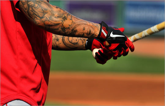 Red Sox outfielder Darnell McDonald's arms are filled with tattoos that have meaning in his life. “I collect art from all over the world. It hurts, man. Some people say it doesn’t but I’m the one that says it does; they all hurt. If it's something that’s important to you pain is only temporary but the art will last a lifetime. “Its just a collage of different times of my life. We’ve got the iconic Bob Marley with the Line of Judah connected, the Virgin Mary -- say no more. It’s all the important times and memories that I wanted to savor. “Getting tattoos is therapeutic for me. I say when I die I’m going to have my life story on my body. I’ve got my daughters, Bo, on there and that’s my youngest daughter, Zuri, 1.'