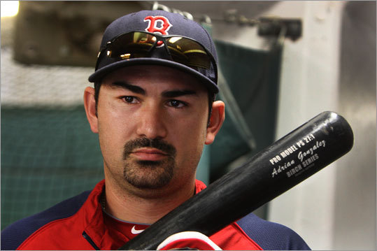 Sox slugger Adrian Gonzalez gets set to step into the hitting cage with the birch bat that carries the name of his favorite psalm, 27:1. “I have Psalm 27:1 on my bats. I’ve been doing that for about four years. God is my light and my salvation/ whom need I fear?/ God is the fortress of my life/of whomshould I be afraid?” “It’s my favorite Bible verse. It gives me strength.” But does it help his batting average? “It’s not like that. That’s not why its on there.”