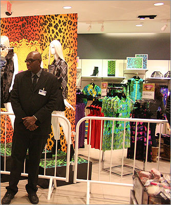 Once customers made it in they were guided to a closed in area where the Versace items were displayed. Customers were only allowed to enter once for 15 minutes. Twelve security guards were on hand to supervise the event.