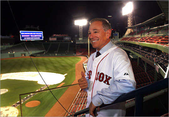 Valentine also posed in the Fenway Park stands, high above the field where he'll direct the Red Sox players.