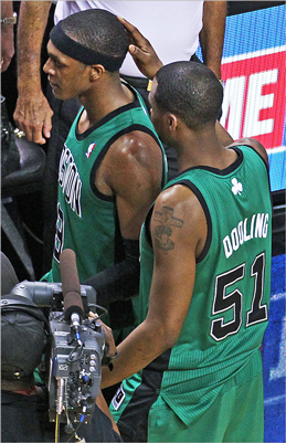 Keyon Dooling gave teammate Rajon Rondo a pat on the head as they left the court following Miami's overtime victory, despite Rondo's 44 points.