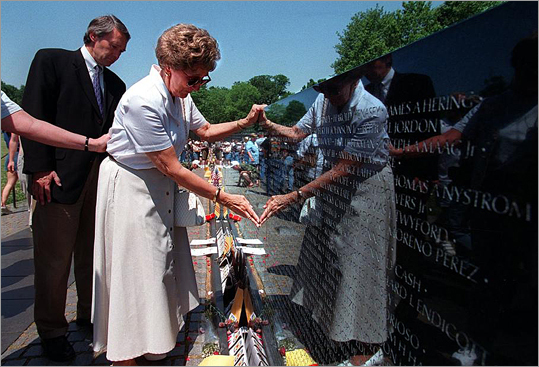 After years of knocking on countless doors and asking anyone and everyone in political office for help, DelRossi, assisted by her son, also named Richard, and other family members, finally prevailed in 1999, when her brother’s name was sandblasted onto the black granite memorial known to many veterans simply as “the Wall.’’ Alice DelRossi touches the name of her brother, Richard B. Fitzgibbon jr. on the Vietnam Veteran's Memorial Wall. Forty Three years after he was killed in Saigon, his name has been added to the Vietnam Veteran's Memorial.