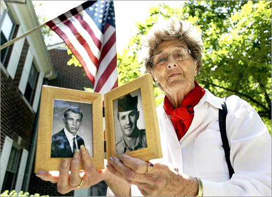 But it took some effort — over 15 years, in fact, by his sister and others — to get the elder Fitzgibbon’s death officially recognized as a war casualty. These days, Alice DelRossi, of Stoneham, often finds herself drawn to the past, lingering over pictures of her brother and nephew, reading newspaper clippings and entries in books about the war. “I look back and read about them every day,’’ she said, her voice strained with emotion. “It doesn’t get any better.’’ Alice DelRossi holds a picture of her brother and his son.
