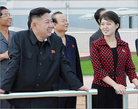 North Korean leader Kim Jong- Un and his wife, who was named by the state broadcaster as Ri Sol-ju, visited the Rungna People's Pleasure Ground, in Pyongyang in this undated picture released by the North's KCNA on July 25,2012.