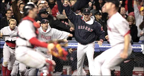 Alan Embree and Jason Varitek prepare to embrace, while the rest of the Red Sox -- including winning pitcher Derek Lowe -- pour onto the field. Alan Embree and Jason Varitek prepare to embrace, while the rest of the Red Sox -- including winning pitcher Derek Lowe -- pour onto the field.