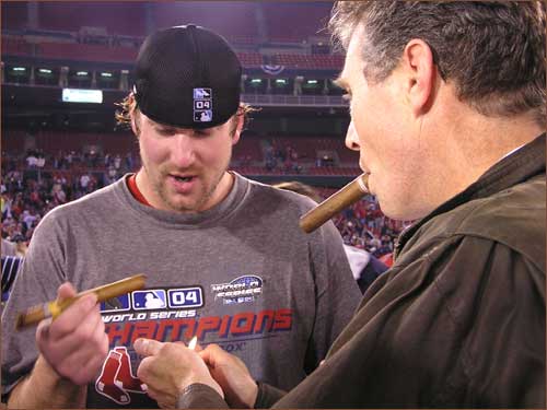The only trouble Game 4 winner Derek Lowe had all night was getting his celebratory cigar to light.
