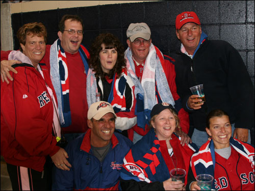 The gang from Manchester, NH was decked out in the more traditional Red Sox colors. While the guys thought the Sox would stay in front if they signed Randy Johnson, the women expressed a desire to get a glimpse of Jason Varitek's behind.