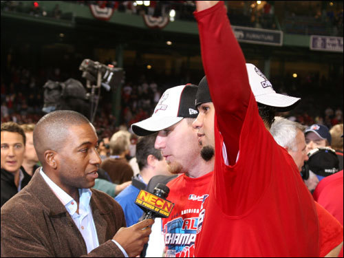 New fan favorite J.D. Drew (center) interviewed with NECN's Chris Collins while Manny Delcarmen saluted the cheering fans.