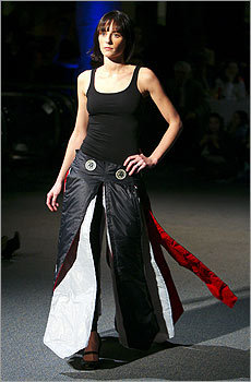 A model wears a 'Sp4rkl3' dress.