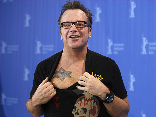 Inked up: Guess the celebrity tattoo. Next · Previous. Tom Arnold