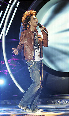 Uh, does this qualify as a fauxhawk? 'American Idol' castaway Sanjaya Malakar debuted this wild style on March 27, 2007. He also tried another 'hawk configuration, pinning his hair into a series of ponytails that ran down the center of his head.
