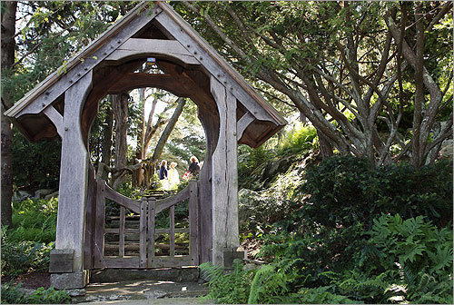 A gate holds the entrance to the moss garden.