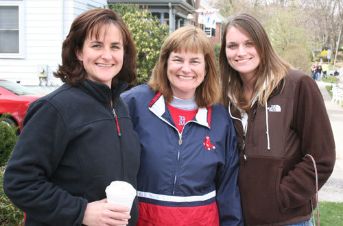 Jennifer Murphy, 38, of Lawrence, her sister Beth Spicer, 47, of Bradford, and Beth’s daughter Allison Spicer, 19, come to their friend’s house on Commonwealth Avenue every year to watch the marathon.