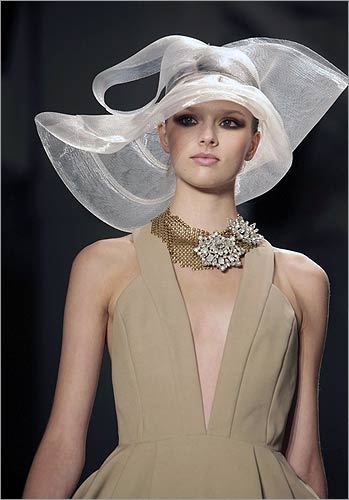 Didn't we tell you hats are in? A model presents a creation at the Erin Fetherston Spring 2010 collection.