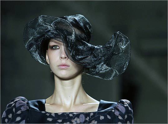 A model shows off one more hat from the Erin Fetherston Spring 2010 collection for good measure.