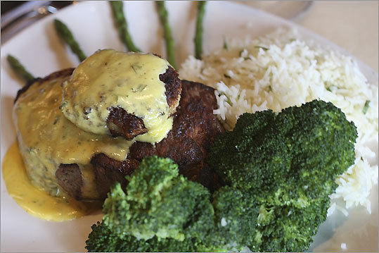 One of the tastiest entrees at Big Papi's is the New York strip steak Oscar style with a crab cake and bearnaise.