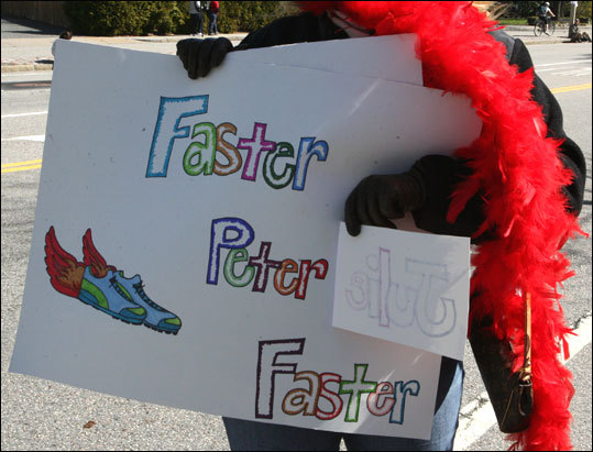 With her clever double-duty sign, Raegan is also supporting Peter Vail. In his last Boston Marathon four years ago, Peter placed in the top 25. This year, with several European runners grounded and unable to compete, he's hoping to place even higher.