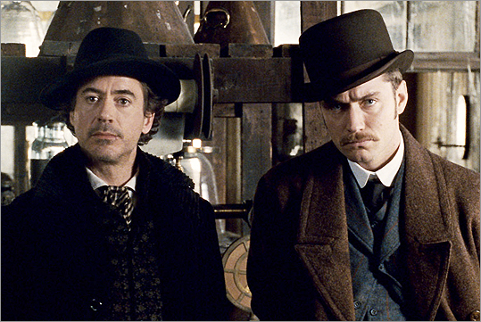 Answer: Robert Downey Jr. (left) in 'Sherlock Holmes,' 2009, alongside Jude Law as Dr. Watson.