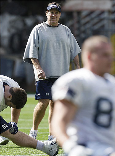 Belichick kept a close eye on his players during stretching drills.