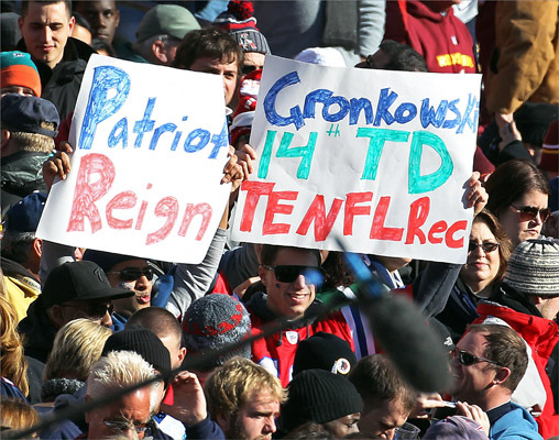These fans came prepared, as they anticipated that Patriots tight end Rob Gronkowski would set the NFL record for most touchdown passses caught by a tight end in a season. And after he did it with his first touchdown of the game, they raised the sign in celebration.
