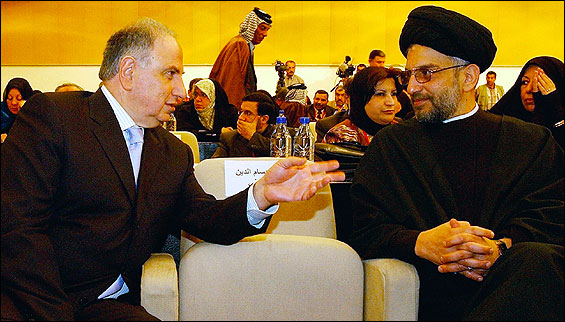 Ahmed Chalabi (L), a candidate for prime minister, and cleric Abdul Aziz al-Hakim spoke at yesterday’s assembly.
