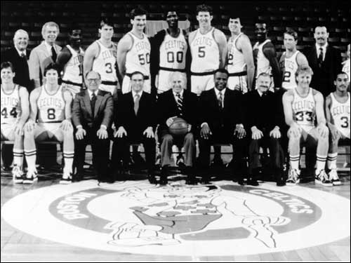 The 1985-86 championship team posed for a photo. Auerbach, team president, sat front and center.