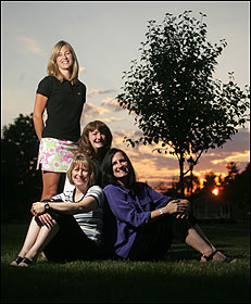 The author, who has 3-year-old twins and a 2-year-old, says her group of nine women has 'lit candles, meditated, prayed, cursed, cried, and sometimes laughed uncontrollably.' Clockwise, from standing: Group members Tracey Bell, Karen O'Neil, Patti Hartigan, and Arlene Childs. The author, who has 3-year-old twins and a 2-year-old, says her group of nine women has 'lit candles, meditated, prayed, cursed, cried, and sometimes laughed uncontrollably.' Clockwise, from standing: Group members Tracey Bell, Karen O'Neil, Patti Hartigan, and Arlene Childs.