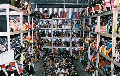 Thousands of counterfeit designer purses crowded the shelves of a Revere storage facility unit.