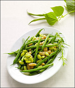 'BEANS X3' Haricots verts are combined with cannellini and lima beans, then tossed with a lemony tarragon vinaigrette for a cool but hearty summer side dish.