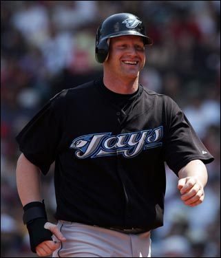 Toronto's Lyle Overbay smiles after scoring the first run of the game off of an Aaron Hill double in the second inning.