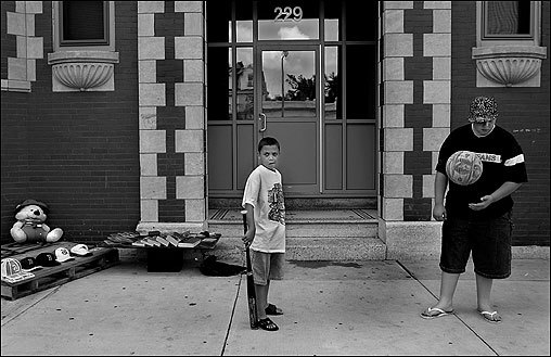 DORCHESTER -- When he grows up, Roberto Torres wants to be a baseball player or a salesman -- 'anything that will keep me on my feet.' On a warm summer day, 14-year-old Torres (right) and 10-year-old Nathaniel Tejada were working on sales in front of their Columbia Road apartment building. 'I'm trying to raise money to go to the Brockton Fair because I haven't gone in a long time,' Torres said. 'My mom can't afford to pay for all of us.' Like salesmen everywhere, the two boys gathered up merchandise and put it on display. Early sales included two Army rings (buy one for $25, get one free), five hats for a total of $20, and two personal digital organizers at $5 each. They were also marketing some books and a stuffed animal. (Photo and Audio by Suzanne Kreiter, Globe Staff) audio: Roberto Torres talks about his sidewalk sale and his future <object classid='clsid:02BF25D5-8C17-4B23-BC80-D3488ABDDC6B' width='200' height='30' codebase= 'http://www.apple.com/qtactivex/qtplugin.cab'>