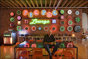 In addition to neon clocks, Bill Baughman has a sign from the Tic Toc Lounge in West Springfield and a jukebox he restored. “I listen to Patsy Cline on it almost every day,” he says.