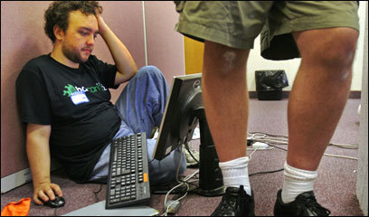 Jesse Baer of Cambridge, a member of the Startup Weekend's user experience team, ponders a problem.
