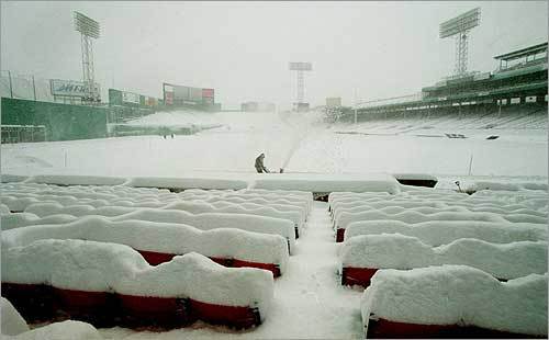 Fenway Park provided the setting for this unusual snow picture taken in spring 1997. It was 63 degrees in Boston on March 31 -- Easter Sunday -- but forecasters were warning of an approaching snowstorm. Many people dismissed the forecast as an April Fools prank. As this picture taken April 1 at the home of the Red Sox shows, the prediction was for real. Before umpires yelled 'Play Ball'' again at Fenway, helicopters were employed in efforts to help dry the field.