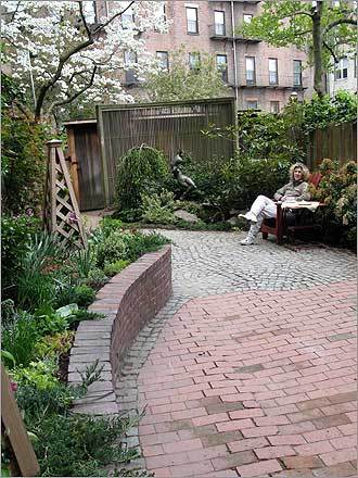 Rogina Jeffries sits in her contemporary garden.