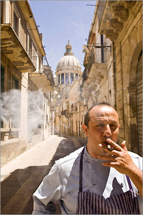 Outside the Il Duomo restaurant in Ragusa Ibla, Sicily, chef Ciccio Sultano takes a cigar break. 'When you look at [Sicilian food] from far away, you feel the harmony that's been created, but there's nothing casual in that harmony,' says Sultano.