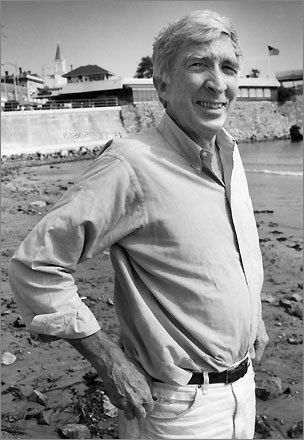 Updike's first published book was a collection of poems, “The Carpentered Hen” (1958). His last, “My Father’s Tears and Other Stories”, is scheduled to be published in June. Updike is seen here on a beach in Swampscott on Sept. 11, 1990.