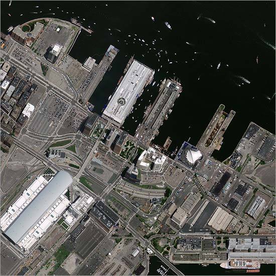 A satellite image of Boston Harbor and the Tall Ships tied up at the pier taken on July 11 from 423 miles in space.